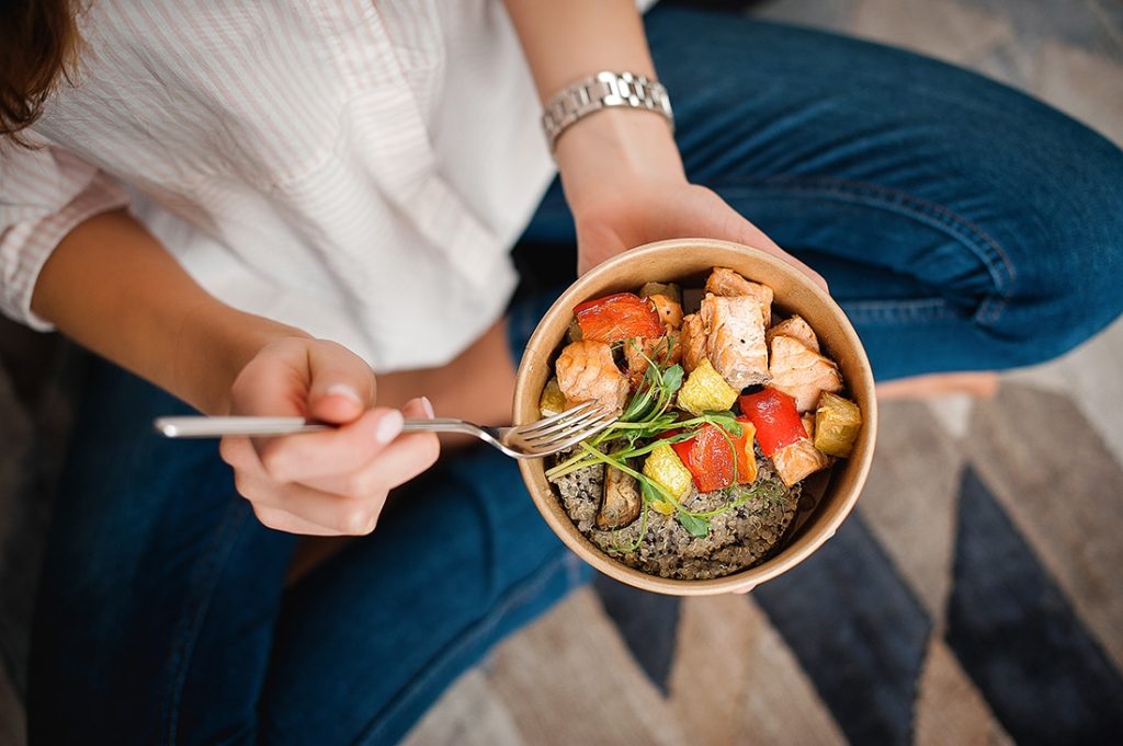 Woman eating healthy meal