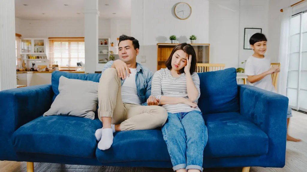 A couple experiencing relationship burnout and emotional disconnection.